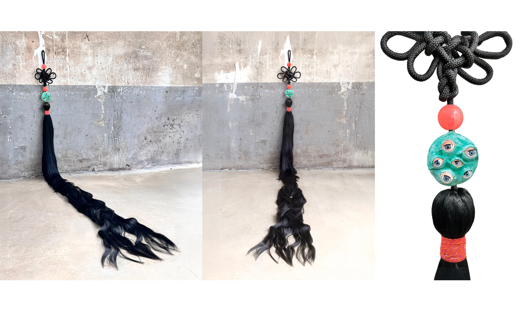 A knotted ornament with beads, doll eyes and a long black hair tassel