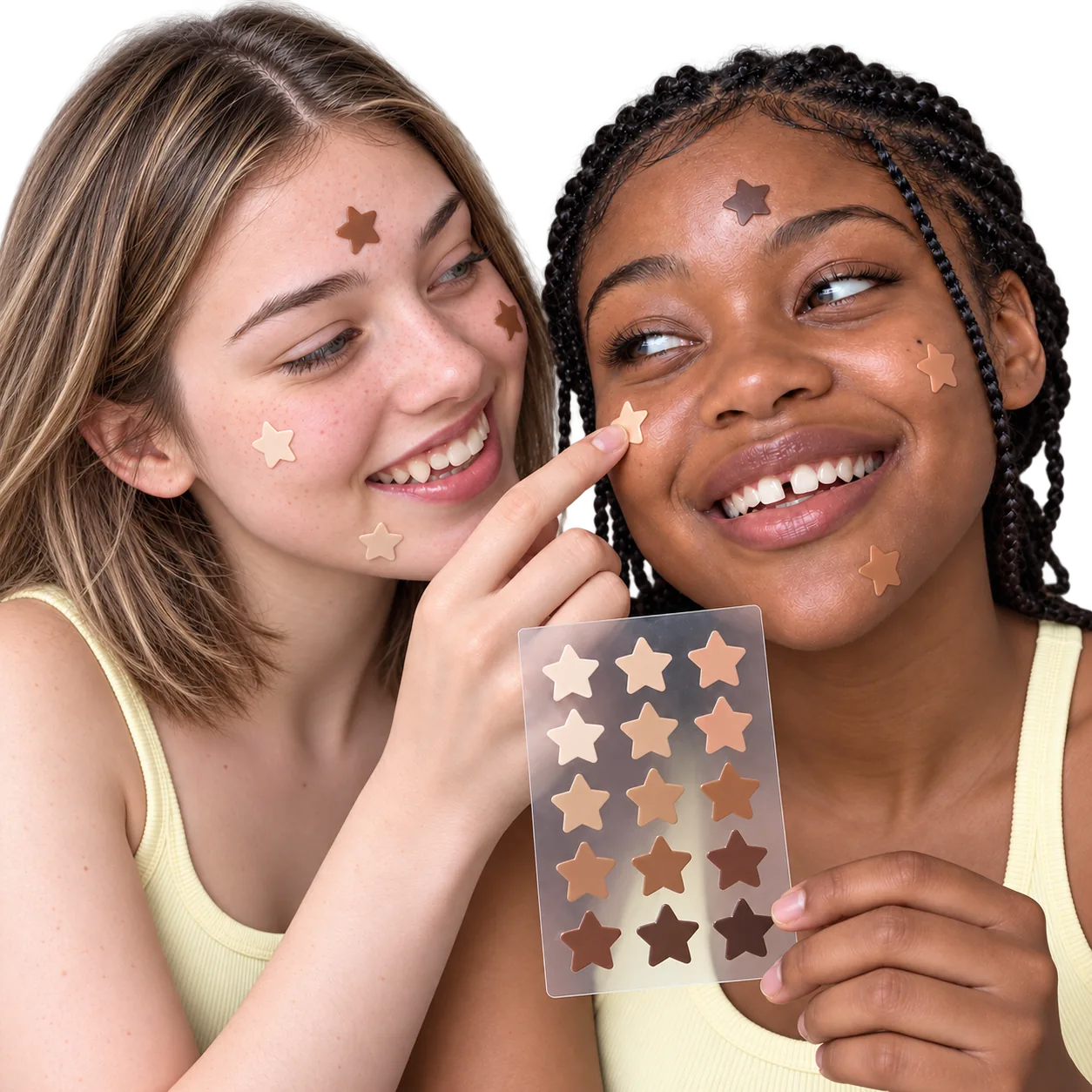 Two girls applying star-shaped SKIN SWAP patches to their faces